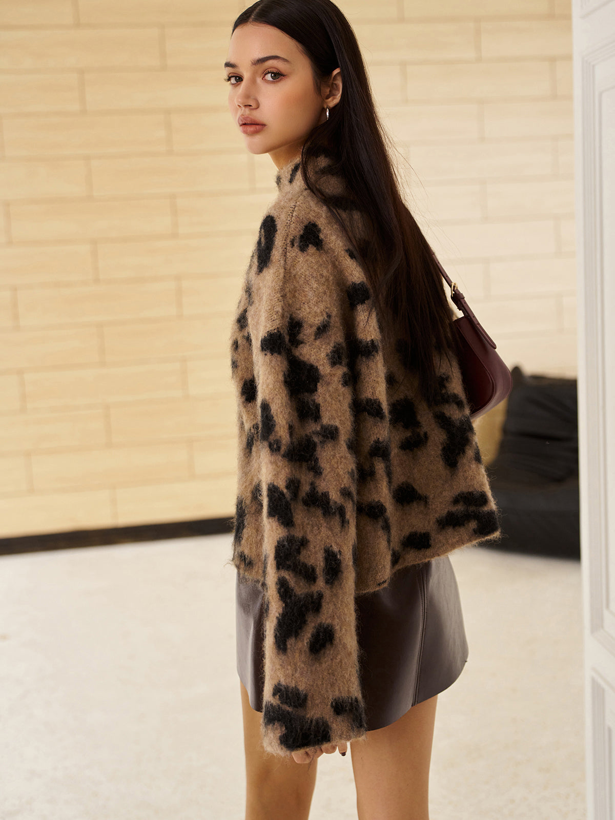 Luxurious fluffy knit with animal print