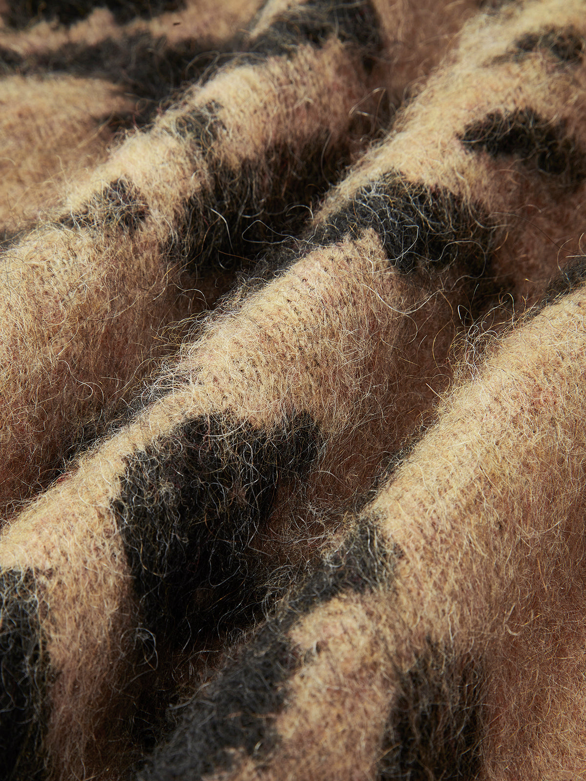 Luxurious fluffy knit with animal print