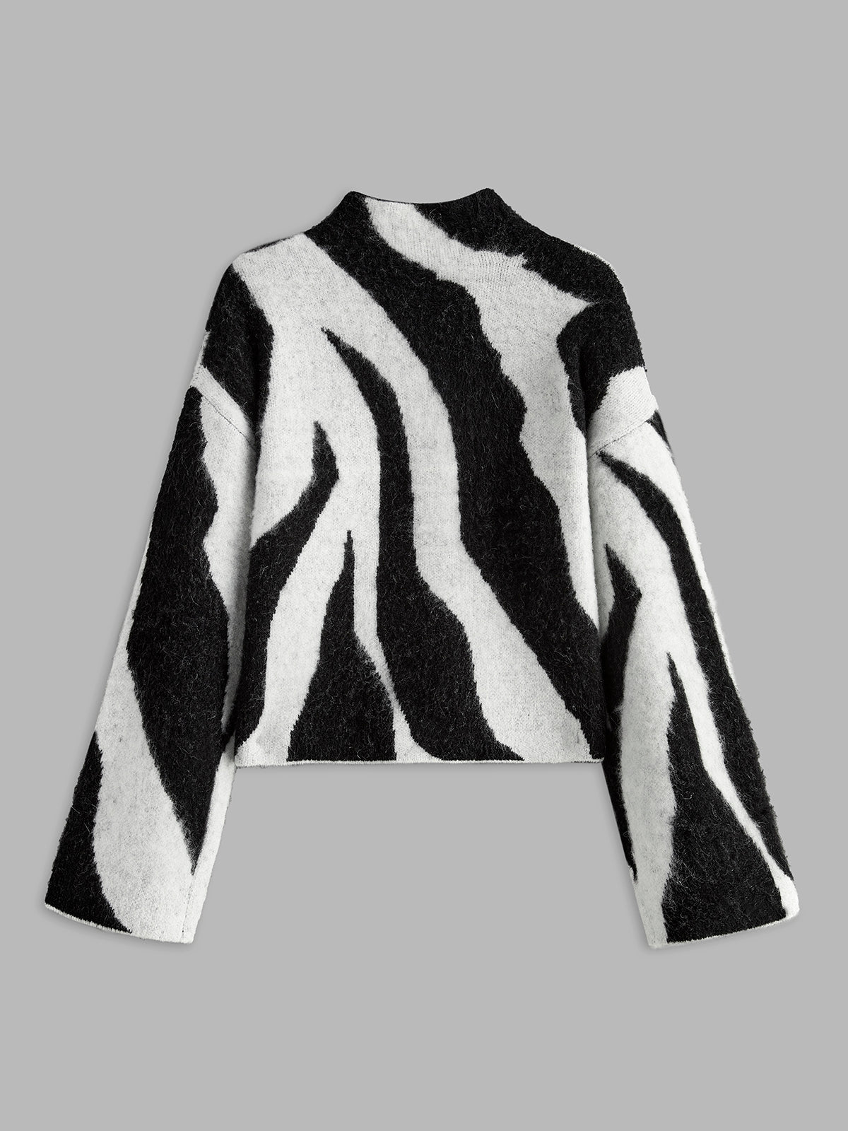 Luxurious fluffy knit with animal print