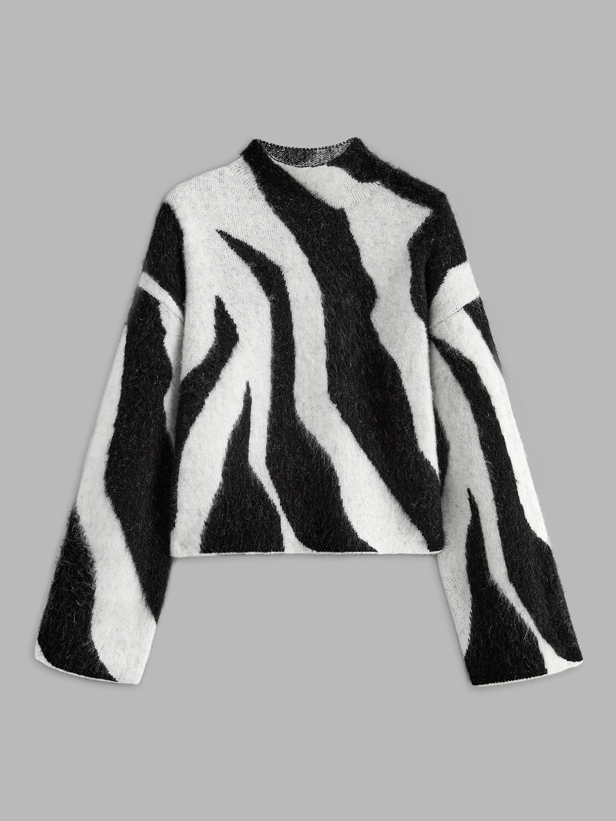 Luxurious fluffy knit with animal print