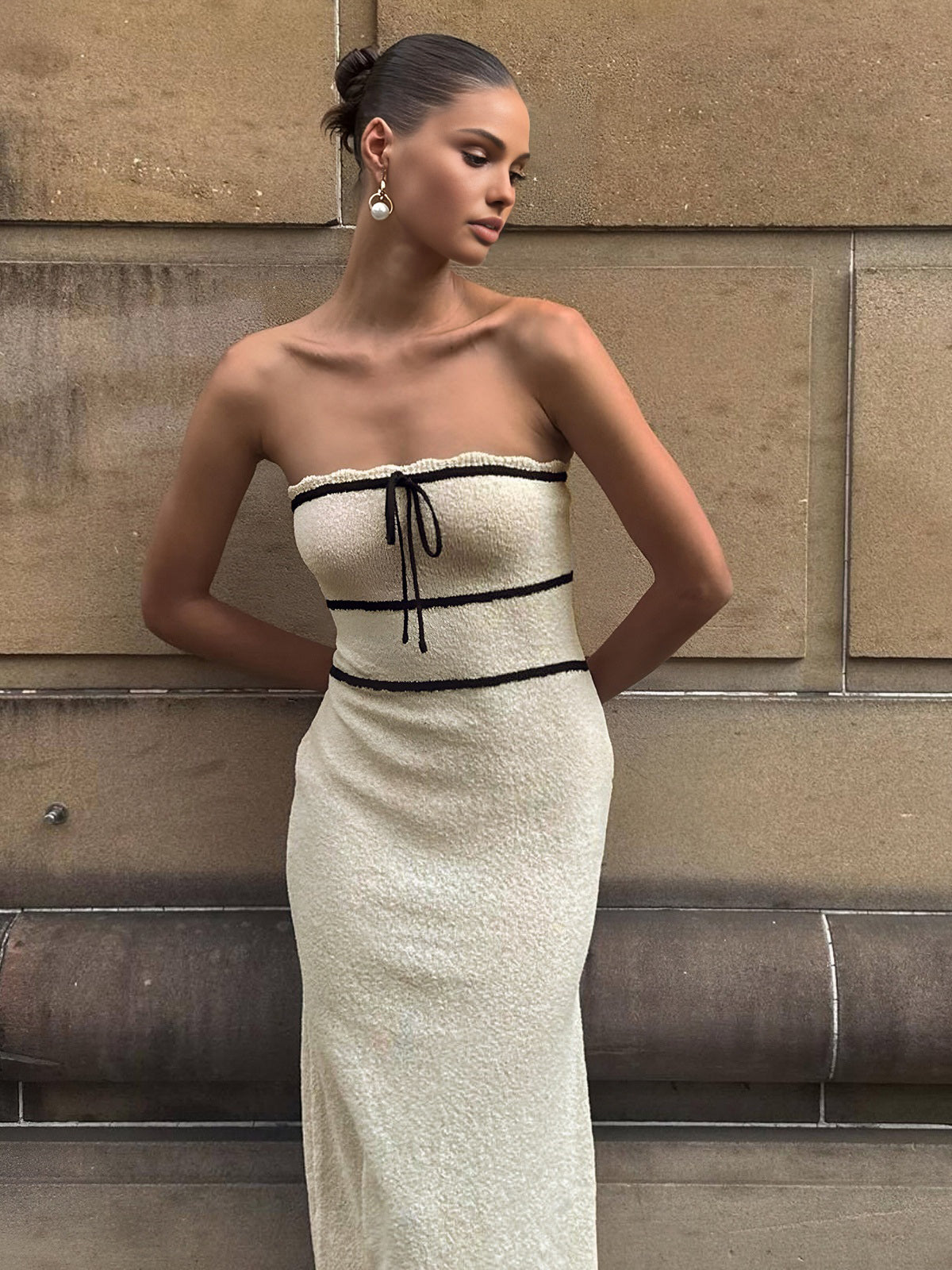 Eleganza gebreide midi jurk met knoopdetail